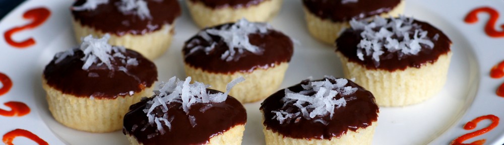 Coconut Cupcakes with Chocolate-Sriracha Ganache